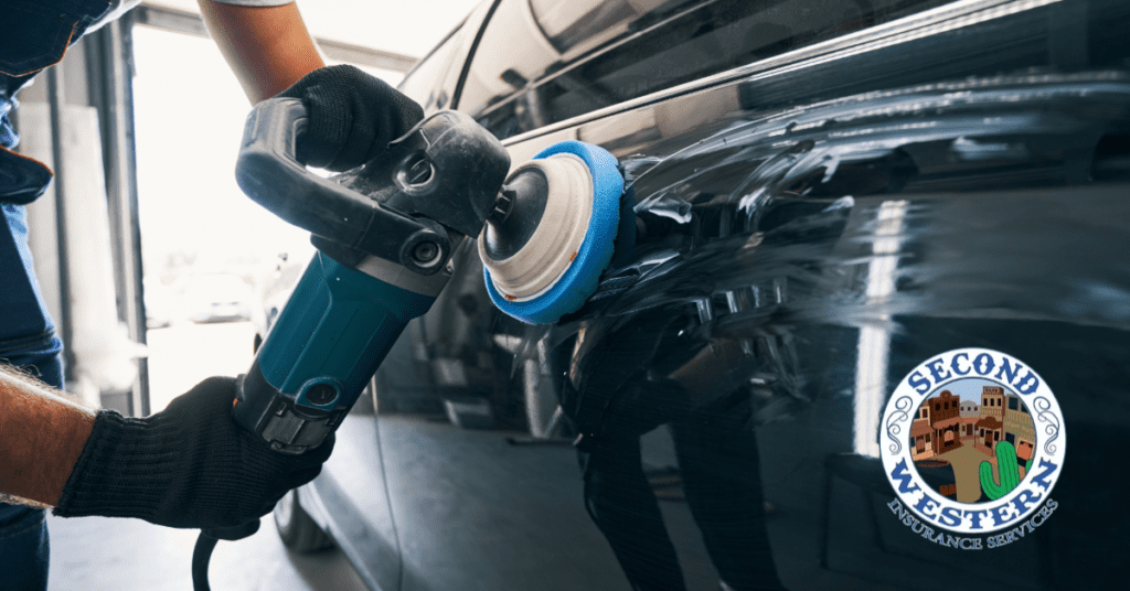 A worker polishing a car with a power tool in an auto body shop, with the Second Western Insurance Services logo displayed in the bottom right corner.